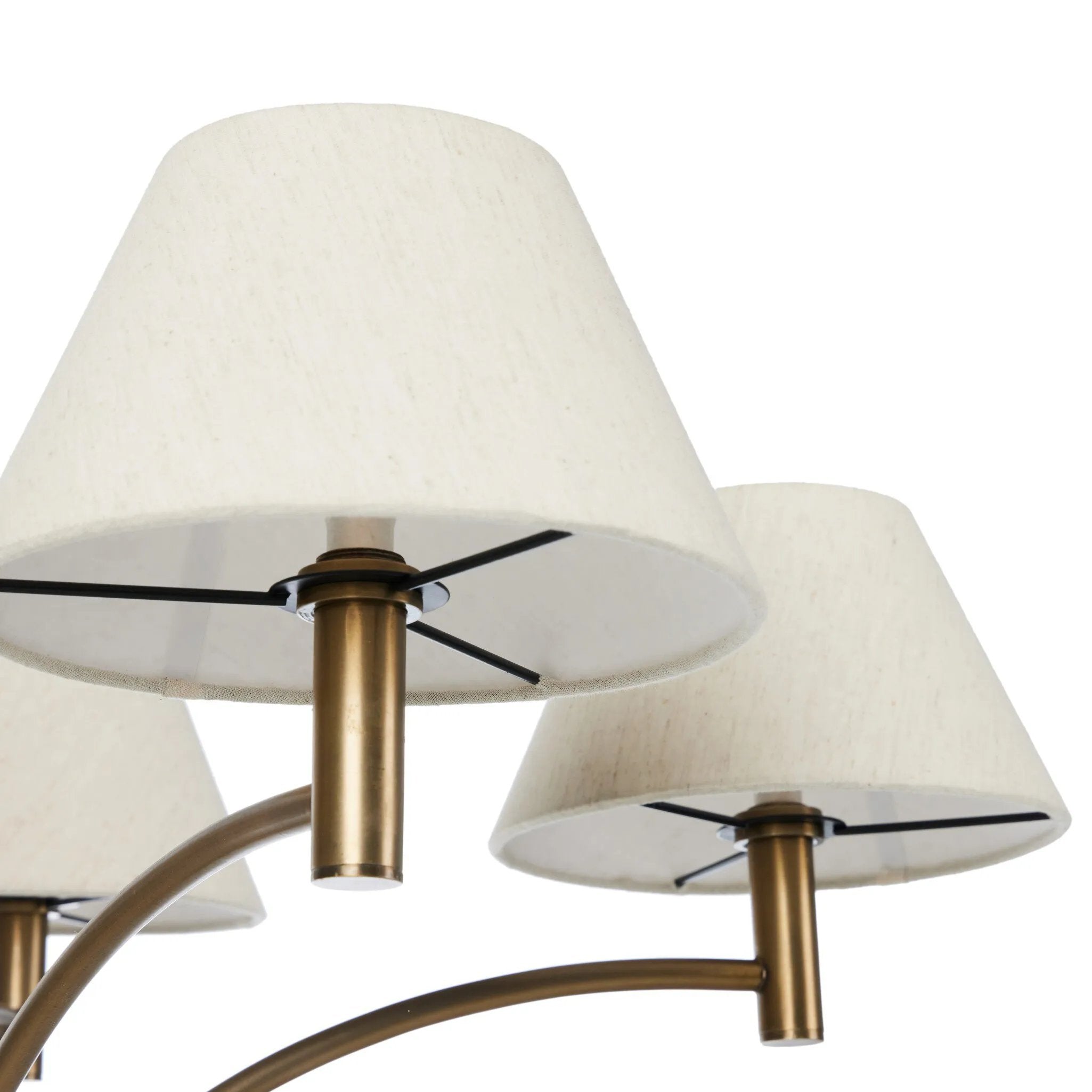 Featuring Linus Aged Brass Iron Chandelier by Four Hands at Amethyst Home. Curved arms and a central ball detail give this chandelier a traditional silhouette, while low tapered shades provide a fresh update. It is designed for versatility and can be hung on slanted ceilings or converted to a flush mount with the included extra pipe piece.
Overall Dimensions: 3. Amethyst Home provides interior design, new home construction design consulting, vintage area rugs, and lighting in the Miami metro area.