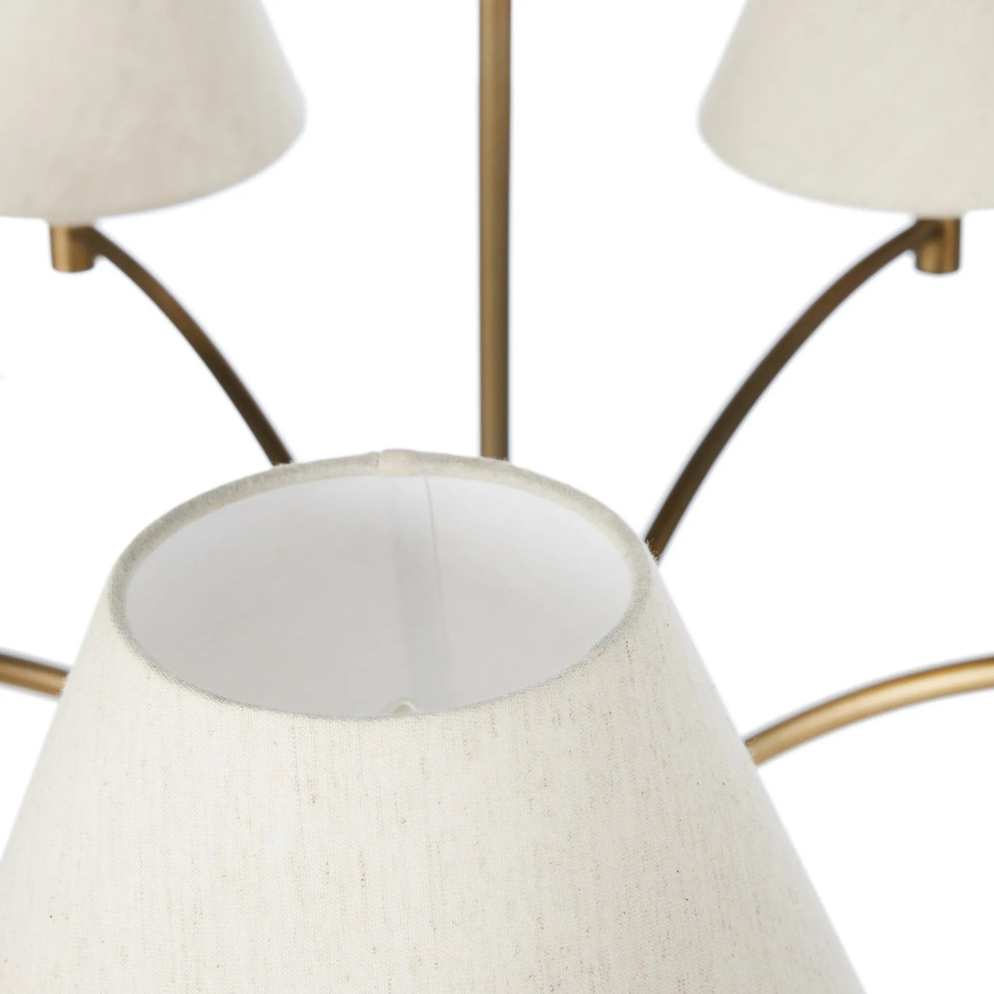 Featuring Linus Aged Brass Iron Chandelier by Four Hands at Amethyst Home. Curved arms and a central ball detail give this chandelier a traditional silhouette, while low tapered shades provide a fresh update. It is designed for versatility and can be hung on slanted ceilings or converted to a flush mount with the included extra pipe piece.
Overall Dimen. Amethyst Home provides interior design, new home construction design consulting, vintage area rugs, and lighting in the Winter Garden metro area.
