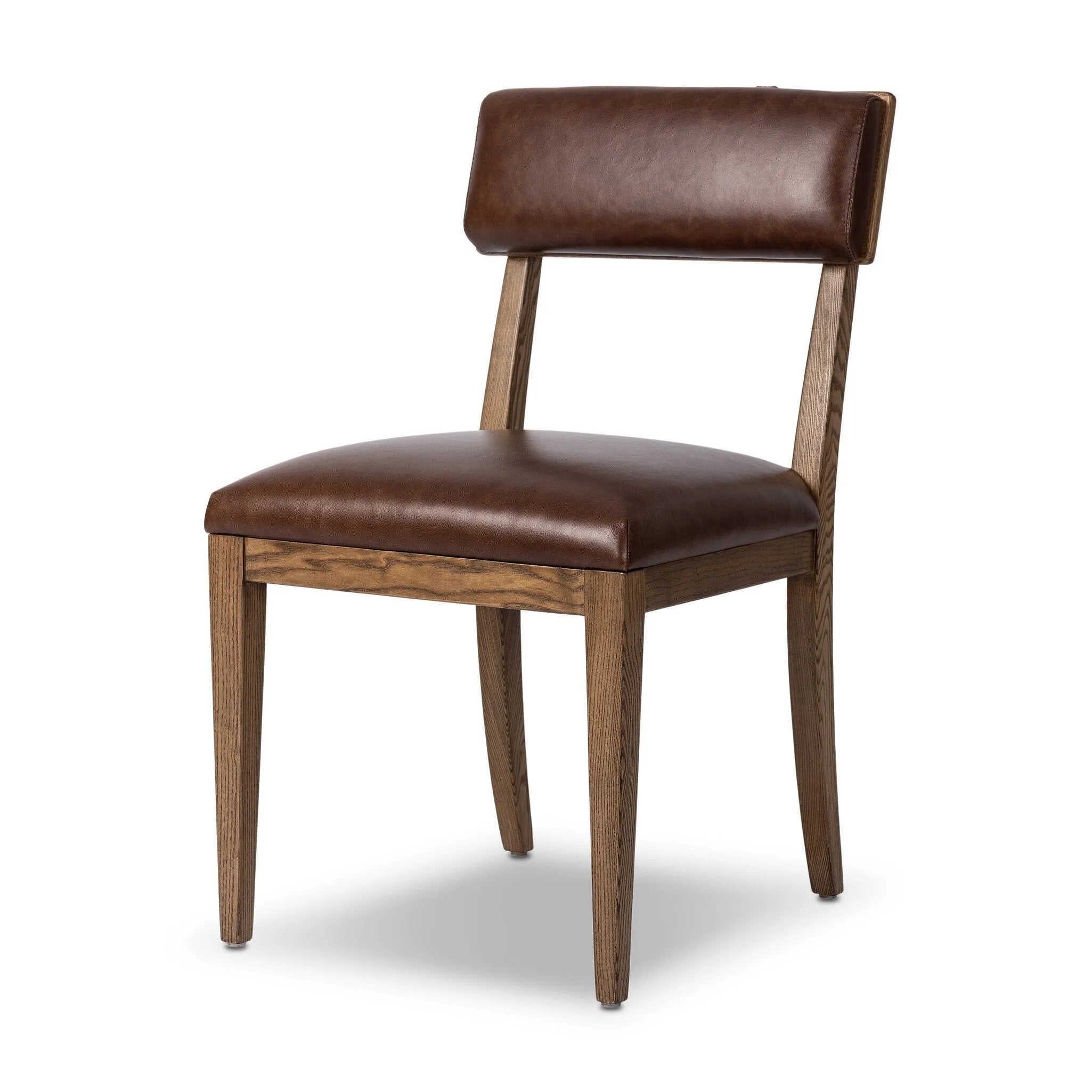 Both modern and traditional, toasted oak frames this high-back, armless dining chair. Finished with a rich brown top-grain leather, with hanging straps affixed to the back Amethyst Home provides interior design, new home construction design consulting, vintage area rugs, and lighting in the Des Moines metro area.