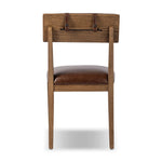Both modern and traditional, toasted oak frames this high-back, armless dining chair. Finished with a rich brown top-grain leather, with hanging straps affixed to the back Amethyst Home provides interior design, new home construction design consulting, vintage area rugs, and lighting in the Seattle metro area.