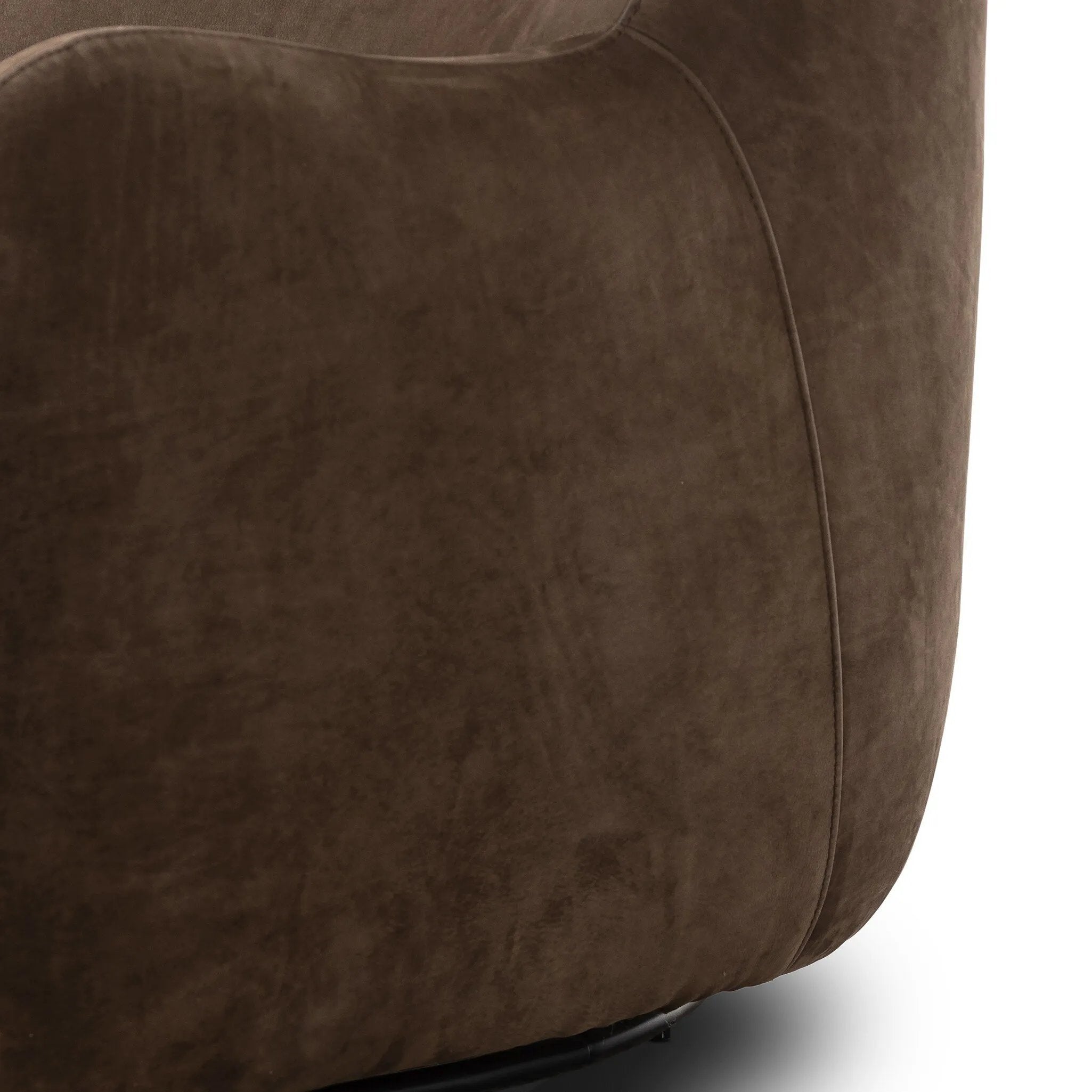 Modern wingback with a twist of barrel back design, this enveloping swivel chair comes with velvety upholstery in a deep brown hue. Deeply cushioned back and seating for maximum comfort, the chair is affixed to a 360-degree swivel base for relaxed lounging Amethyst Home provides interior design, new home construction design consulting, vintage area rugs, and lighting in the Austin metro area.