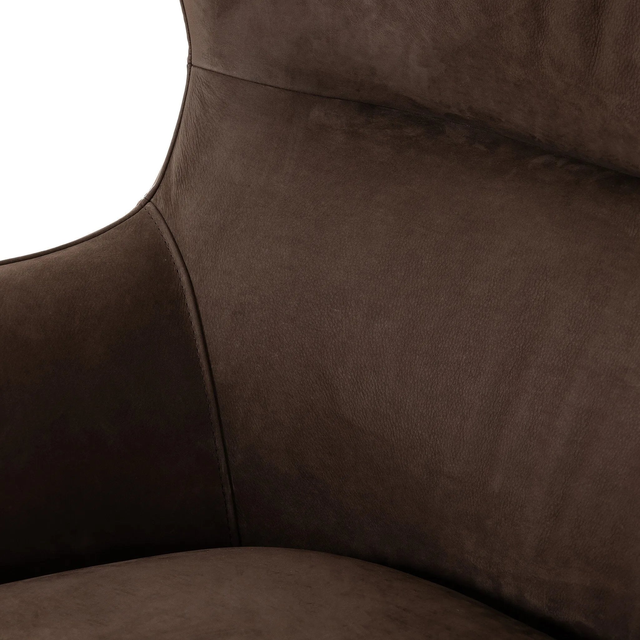 Modern wingback with a twist of barrel back design, this enveloping swivel chair comes with velvety upholstery in a deep brow