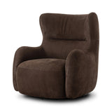 Modern wingback with a twist of barrel back design, this enveloping swivel chair comes with velvety upholstery in a deep brow