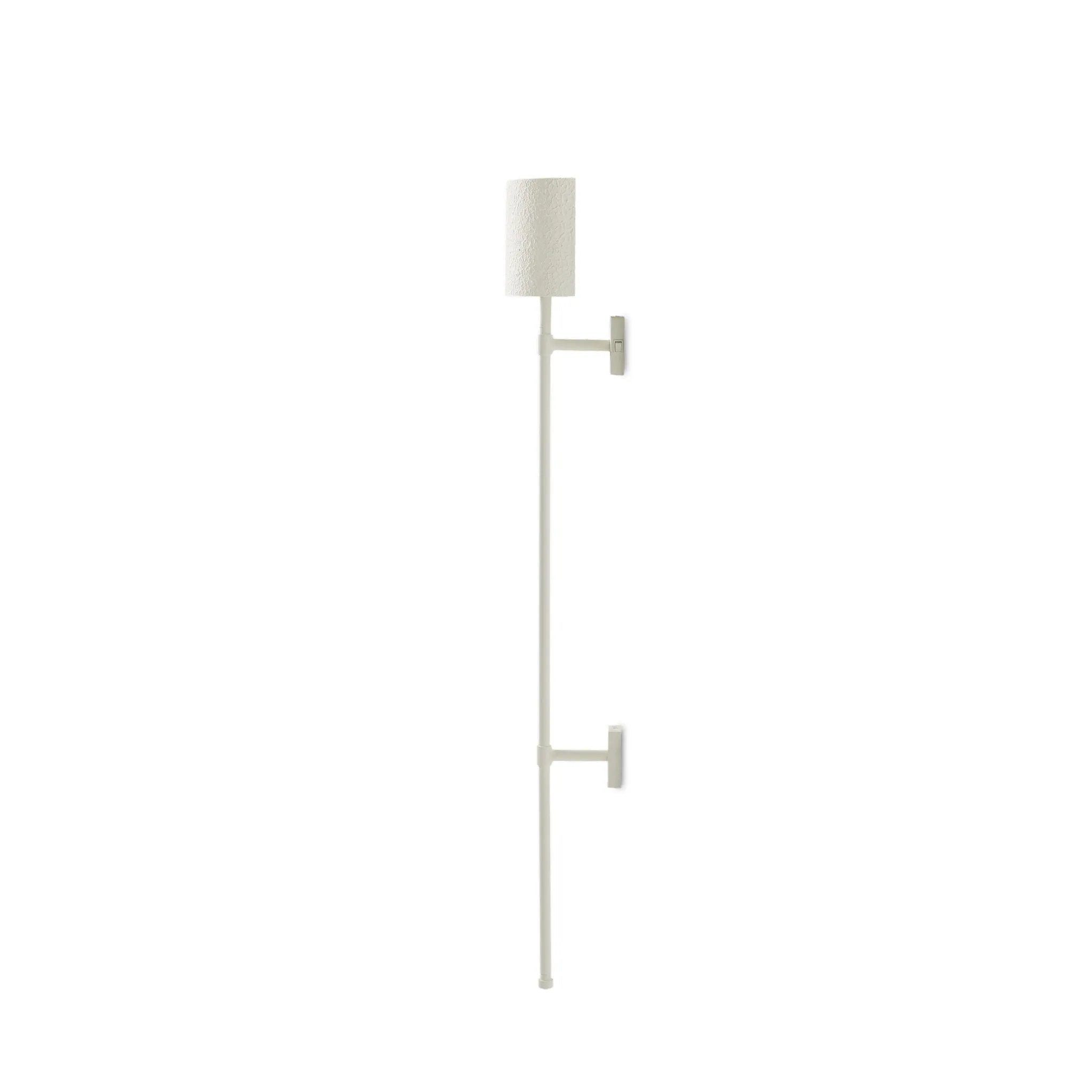 Featuring Maurice Matte White Plaster Sconce by Four Hands at Amethyst Home. Housed behind a curved black shade, light beams with a soft glow both upward and downward from this plug-in sconce.  A  slim pole to hide the cord and a convenient switch on the backplate create a seamless look.Overall Dimensions: 8.00"w x 7.50"d x 50.00"hWeight : 6.61 lbsMaterials: I. Amethyst Home provides interior design, new home construction design consulting, vintage area rugs, and lighting in the Austin metro area.