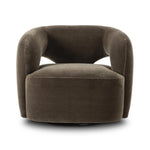 Featuring Mazie Monte Olive Swivel Chair by Four Hands at Amethyst Home. A fluid play on seating. This statement-making swivel chair features subtle cutouts on the back, with plush arms that hug the seat. Upholstered in an olive faux wool-mohair, bringing a plush moment to a classic frame.Overall Dimensions: 36.00"w x 32.00"d x 28.50"hWeight : 71.65 lbsMateria. Amethyst Home provides interior design, new home construction design consulting, vintage area rugs, and lighting in the Austin metro area.
