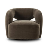 Featuring Mazie Monte Olive Swivel Chair by Four Hands at Amethyst Home. A fluid play on seating. This statement-making swivel chair features subtle cutouts on the back, with plush arms that hug the seat. Upholstered in an olive faux wool-mohair, bringing a plush moment to a classic frame.Overall Dimensions: 36.00"w x 32.00"d x 28.50"hWeight : 71.65 lbsMate. Amethyst Home provides interior design, new home construction design consulting, vintage area rugs, and lighting in the Nashville metro area.