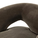 Featuring Mazie Monte Olive Swivel Chair by Four Hands at Amethyst Home. A fluid play on seating. This statement-making swivel chair features subtle cutouts on the back, with plush arms that hug the seat. Upholstered in an olive faux wool-mohair, bringing a plush moment to a classic frame.Overall Dimensions: 36.00"w x 32.00"d x 28.50"hWeight : 71.65 lbsMate. Amethyst Home provides interior design, new home construction design consulting, vintage area rugs, and lighting in the San Diego metro area.