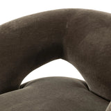 Featuring Mazie Monte Olive Swivel Chair by Four Hands at Amethyst Home. A fluid play on seating. This statement-making swivel chair features subtle cutouts on the back, with plush arms that hug the seat. Upholstered in an olive faux wool-mohair, bringing a plush moment to a classic frame.Overall Dimensions: 36.00"w x 32.00"d x 28.50"hWeight : 71.65 lbsMate. Amethyst Home provides interior design, new home construction design consulting, vintage area rugs, and lighting in the San Diego metro area.