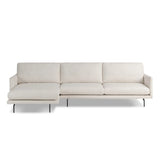 Featuring Melle Omari Natural 2-Piece Sectional by Four Hands at Amethyst Home. A minimalist form to redefine the contemporary sectional. Made from light, neutral high-performance with a slim profile, expert tailoring and plush cushions for comfort. Sleek metal legs and compact sizing make this piece a versatile anchor for smaller living spaces. Performance f. Amethyst Home provides interior design, new home construction design consulting, vintage area rugs, and lighting in the Houston metro area.