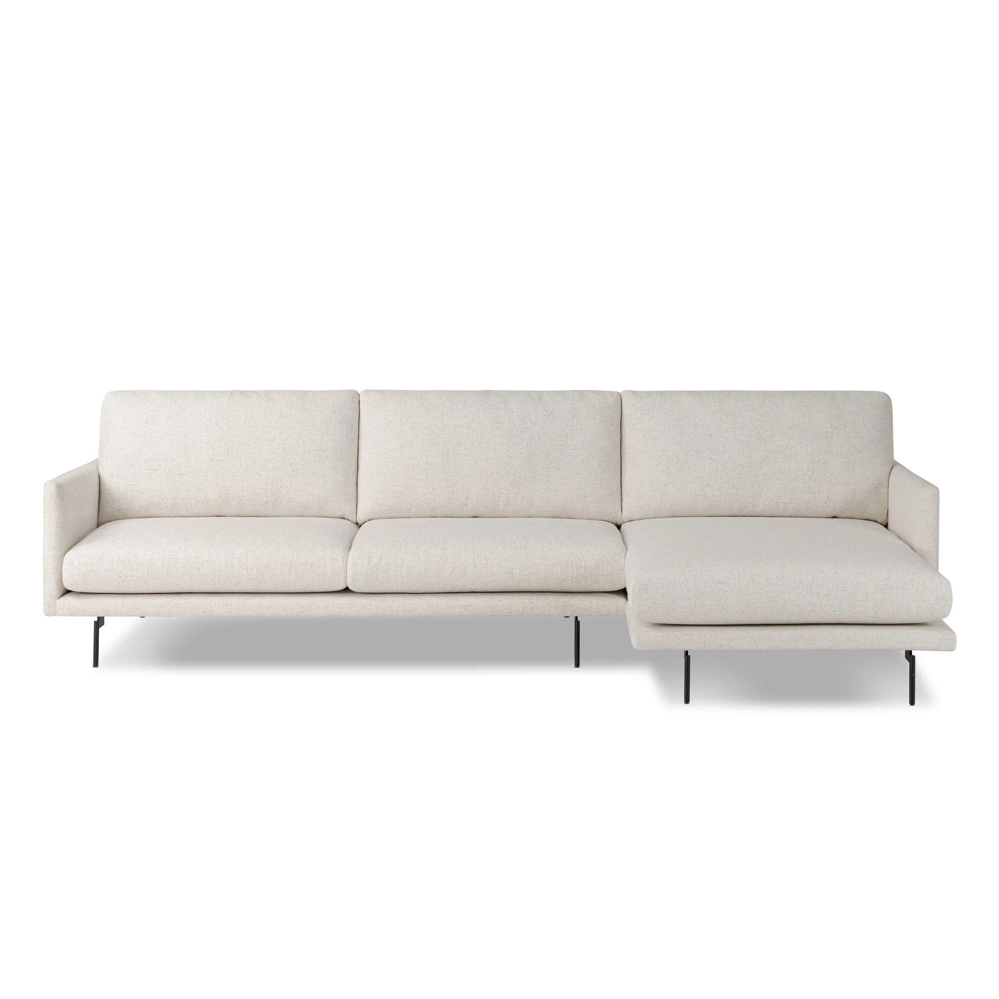 Featuring Melle Omari Natural 2-Piece Sectional by Four Hands at Amethyst Home. A minimalist form to redefine the contemporary sectional. Made from light, neutral high-performance with a slim profile, expert tailoring and plush cushions for comfort. Sleek metal legs and compact sizing make this piece a versatile anchor for smaller living spaces. Performanc. Amethyst Home provides interior design, new home construction design consulting, vintage area rugs, and lighting in the Washington metro area.