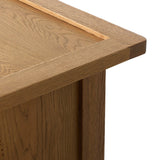 Drawing inspiration from a vintage general store counter, a storage-driven dresser reflects traditional and functional design. Thick oak legs with softened corners provide sturdy support, while oak knobs add a classic touch. An inset tray top and a versatile drawer configuration offer ample storage Amethyst Home provides interior design, new home construction design consulting, vintage area rugs, and lighting in the Boston metro area.