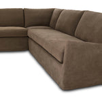 This three-piece sectional is defined by slightly sloping, flared arms and a floor-length slipcover. Finished in a soft, tight weave slipcover for a traditional style. Durable and soft to the touch, Libeco™-sourced linens are artisan-made and free of toxic chemicals. Slipcovered styles are fully removable and machine-washable for easy care Amethyst Home provides interior design, new home construction design consulting, vintage area rugs, and lighting in the Salt Lake City metro area.
