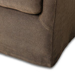 This relaxing glider chair is defined by slightly sloping, flared arms and a floor-length slipcover that's finished in a soft, tight weave for a traditional style Amethyst Home provides interior design, new home construction design consulting, vintage area rugs, and lighting in the Boston metro area.