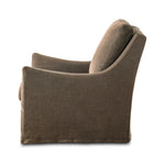 This relaxing glider chair is defined by slightly sloping, flared arms and a floor-length slipcover that's finished in a soft, tight weave for a traditional style Amethyst Home provides interior design, new home construction design consulting, vintage area rugs, and lighting in the Charlotte metro area.