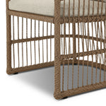 Cottage-inspired, faux hyacinth mimics its natural counterpart, with joint wrapping and texture for depth and character defining this outdoor dining chair. Varied proportion for dimension. Upholstered in a UV-resistant, water-repellent, quick-drying fabric. Cover or store indoors during inclement weather and when not in use Amethyst Home provides interior design, new home construction design consulting, vintage area rugs, and lighting in the Omaha metro area.