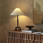 Featuring Neville Matte Black Cast Aluminum Table Lamp by Four Hands at Amethyst Home. Cast aluminum forms a candlestick-inspired base, accented with uniquely shaped legs. A tapered linen shade offers a sleek finishing detail.
Overall Dimensions: 16.0" L x 16.0 " W x 24.25" H
Materials: Aluminum, ThermoplasticWeight: 3.4 lbs. Amethyst Home provides interior design, new home construction design consulting, vintage area rugs, and lighting in the Omaha metro area.