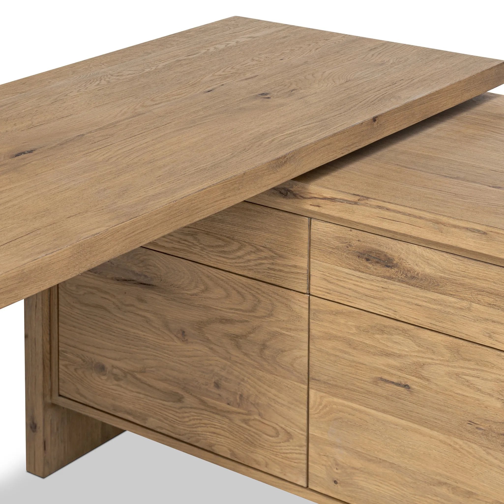 Customization and functionality fuse in a rotating desk of aged smoked oak. With plenty of storage space by way of drawers and cabinetry, a unique L shape and 360-degree mobility offer several orientation options, to comfortably suit a wide range of spaces Amethyst Home provides interior design, new home construction design consulting, vintage area rugs, and lighting in the Kansas City metro area.