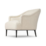 With elements of past eras at play, this updated Deco chair features a rounded back, sloped arms and a dramatic channel. The iron base and tapered legs support the cushiony seat — built with spring suspensions for long-lasting comfort. Amethyst Home provides interior design, new home construction design consulting, vintage area rugs, and lighting in the Austin metro area.
