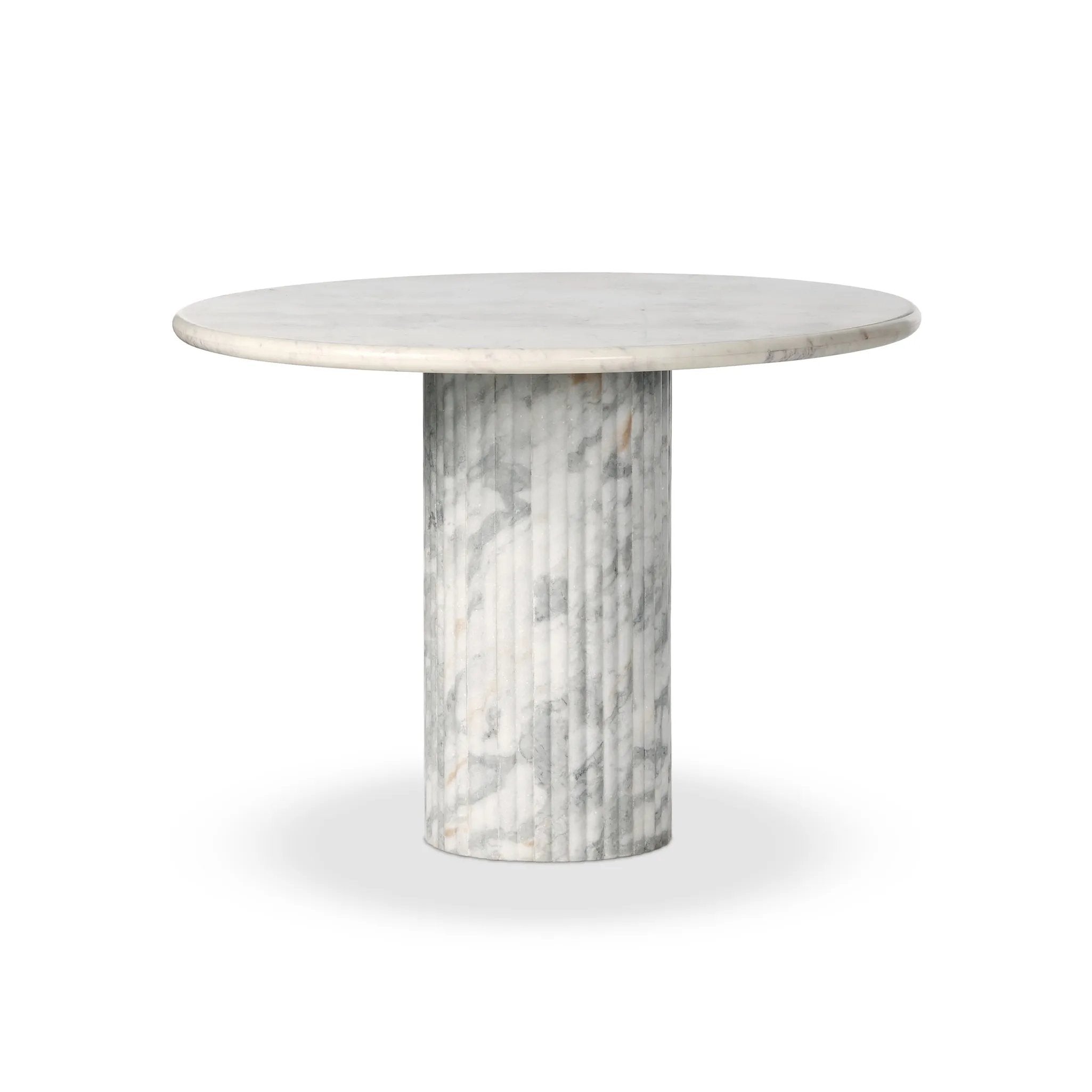 Featuring Oranda Polished White Marble Sealant Round Dining Table by Four Hands at Amethyst Home. Inspired by Italian design, a swirling marble base is scalloped for a linear look with heavy texture, finished with a rounded, bistro-size tabletop of polished white marble.Overall Dimensions: 42.00"w x 42.00"d x 30.00"hWeight : 195.00 lbsMaterials : Solid Mar. Amethyst Home provides interior design, new home construction design consulting, vintage area rugs, and lighting in the Scottsdale metro area.