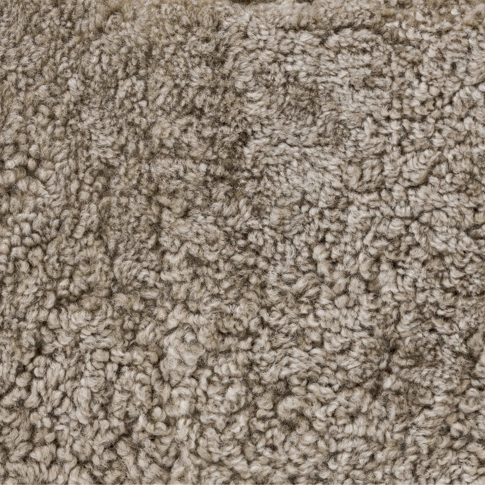 Featuring Oslo Taupe Shearling Ottoman by Four Hands at Amethyst Home. A subtle sweetheart shape paired with beige shearling plays into this ottoman's found object appeal. S-spring suspension offers a comfy place to sit and the shearling upholstery brings depth and vintage vibes throughout. Perfect styled alone or as part of a set for added drama. A desig. Amethyst Home provides interior design, new home construction design consulting, vintage area rugs, and lighting in the Kansas City metro area.