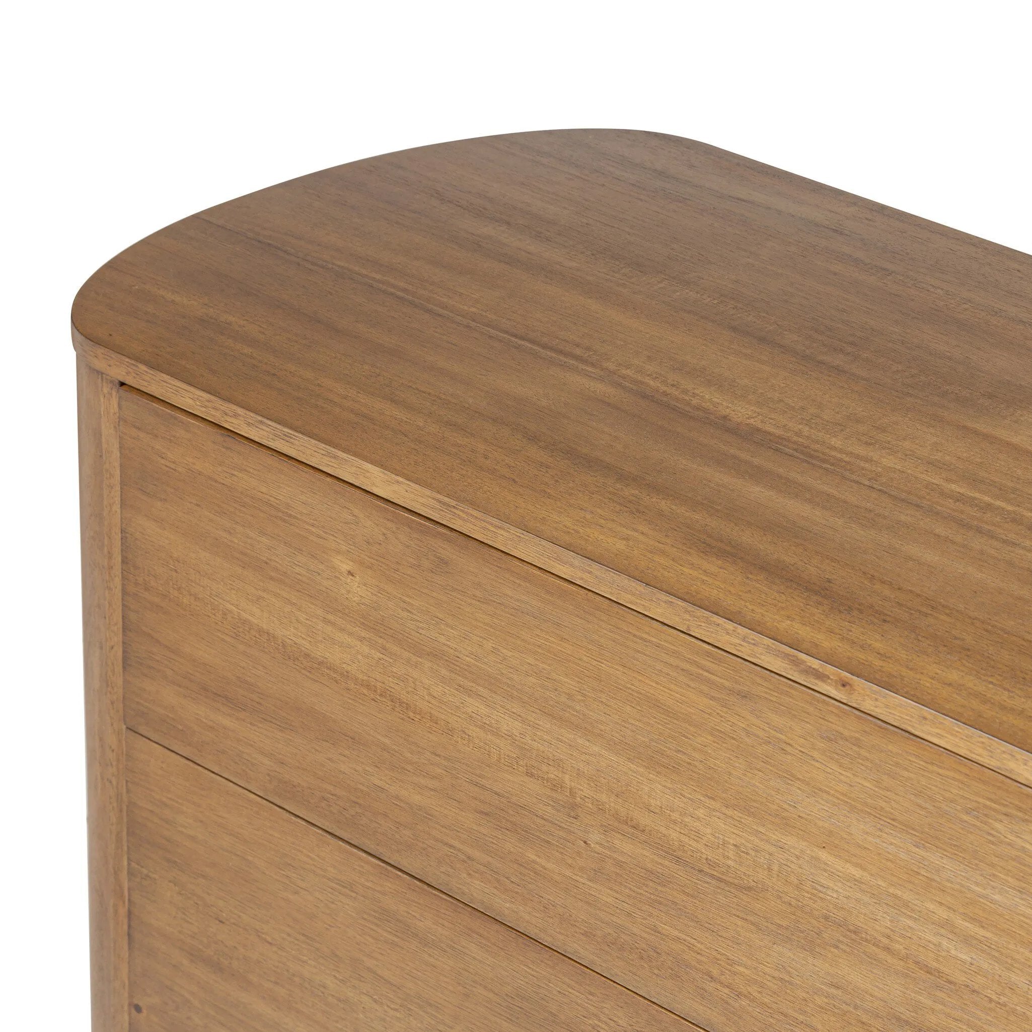 Seasoned brown acacia forms a pedestal base, bringing gentle curves to a classic dresser shape. Six drawers bring spacious storage to the bedroom Amethyst Home provides interior design, new home construction design consulting, vintage area rugs, and lighting in the Houston metro area.