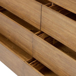 Seasoned brown acacia forms a pedestal base, bringing gentle curves to a classic dresser shape. Six drawers bring spacious storage to the bedroom Amethyst Home provides interior design, new home construction design consulting, vintage area rugs, and lighting in the Scottsdale metro area.