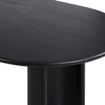 Featuring Paden Aged Black Acacia Dining Table by Four Hands at Amethyst Home. A study in shape. Solid black acacia forms crescent legs and a sprawling oval-shaped tabletop, bringing organic presence to the dining room. Seats 8–10 people.Overall Dimensions: 94.00"w x 42.00"d x 30.00"hWeight : 139.33 lbsMaterials : Thin Acacia Veneer, Solid Acacia. Amethyst Home provides interior design, new home construction design consulting, vintage area rugs, and lighting in the Miami metro area.