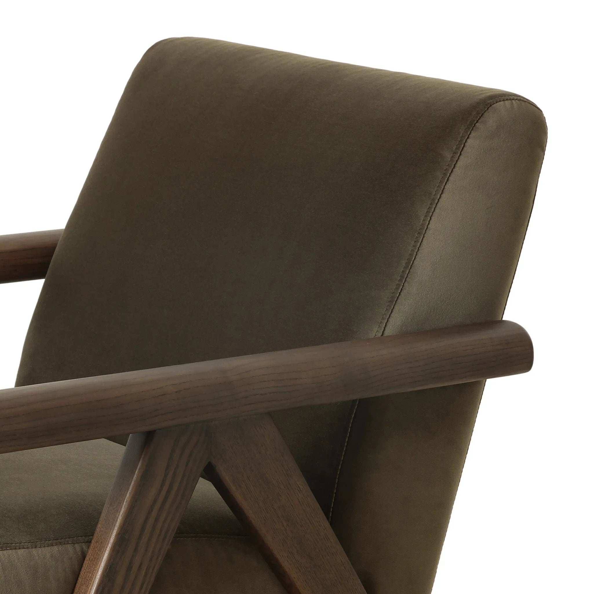 Contemporary outfitting of a vintage chair design offers easy comfort. Upholstered in velvety olive green, the wooden frame is finished in a vintage ash hue. Ideally placed as an accent chair or in pairs Amethyst Home provides interior design, new home construction design consulting, vintage area rugs, and lighting in the Newport Beach metro area.