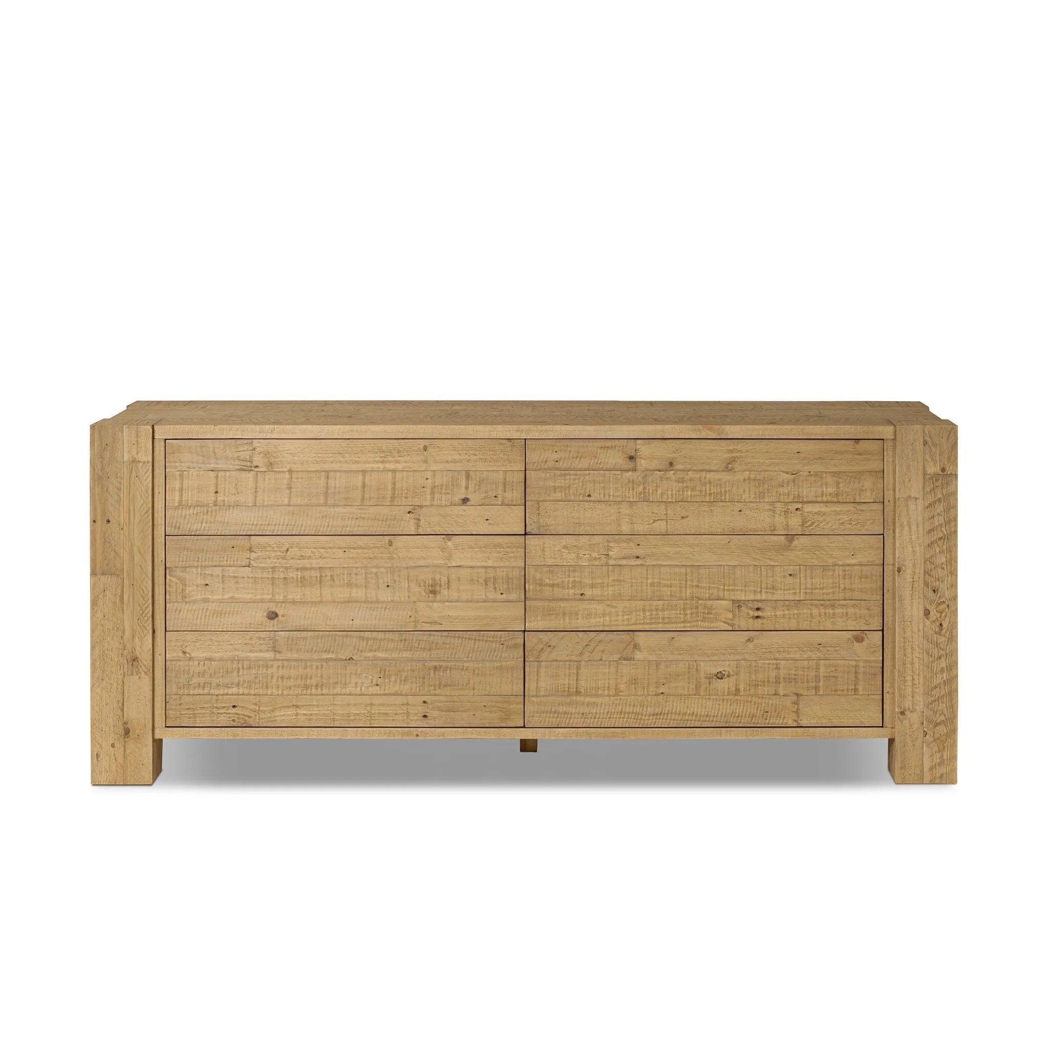 Beauty in simplicity. A clean, spacious six-drawer dresser of blonde-finished pine can be styled into a wide range of styles thanks to its neutral versatility Amethyst Home provides interior design, new home construction design consulting, vintage area rugs, and lighting in the Omaha metro area.
