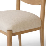 Featuring Piran Essence Natural Dining Chair by Four Hands at Amethyst Home. A celebration of simplicity. Natural nettlewood frames a comfortable linen-blend seat, while a subtle arc at the backrest's base softens clean, tapered lines. Performance fabrics are specially created to withstand spills, stains, high traffic and wear, ensuring long-term comfor. Amethyst Home provides interior design, new home construction design consulting, vintage area rugs, and lighting in the Newport Beach metro area.