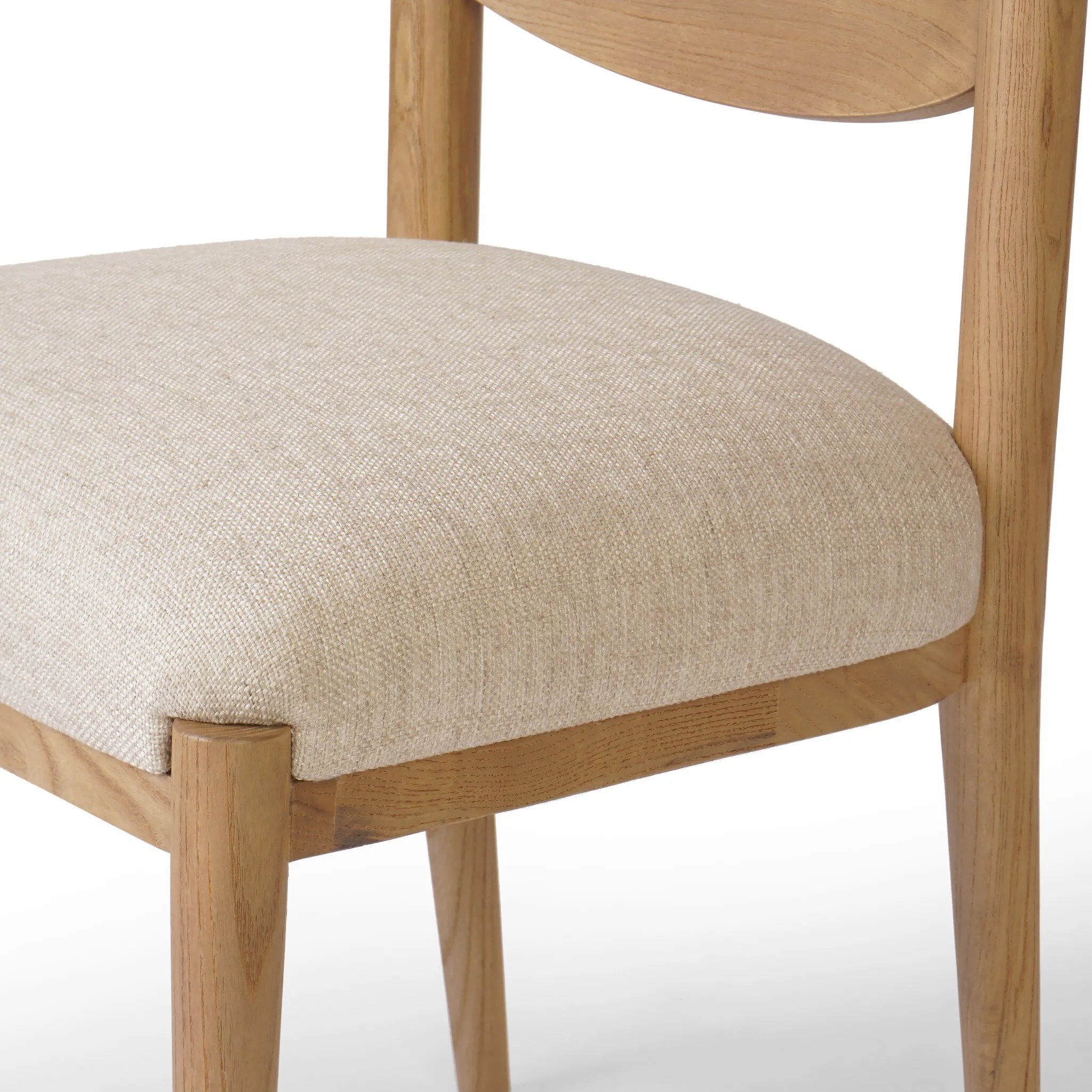 Featuring Piran Essence Natural Dining Chair by Four Hands at Amethyst Home. A celebration of simplicity. Natural nettlewood frames a comfortable linen-blend seat, while a subtle arc at the backrest's base softens clean, tapered lines. Performance fabrics are specially created to withstand spills, stains, high traffic and wear, ensuring long-term comfort an. Amethyst Home provides interior design, new home construction design consulting, vintage area rugs, and lighting in the Park City metro area.