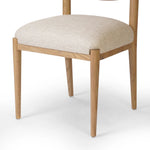 Featuring Piran Essence Natural Dining Chair by Four Hands at Amethyst Home. A celebration of simplicity. Natural nettlewood frames a comfortable linen-blend seat, while a subtle arc at the backrest's base softens clean, tapered lines. Performance fabrics are specially created to withstand spills, stains, high traffic and wear, ensuring long-term comfort an. Amethyst Home provides interior design, new home construction design consulting, vintage area rugs, and lighting in the San Diego metro area.