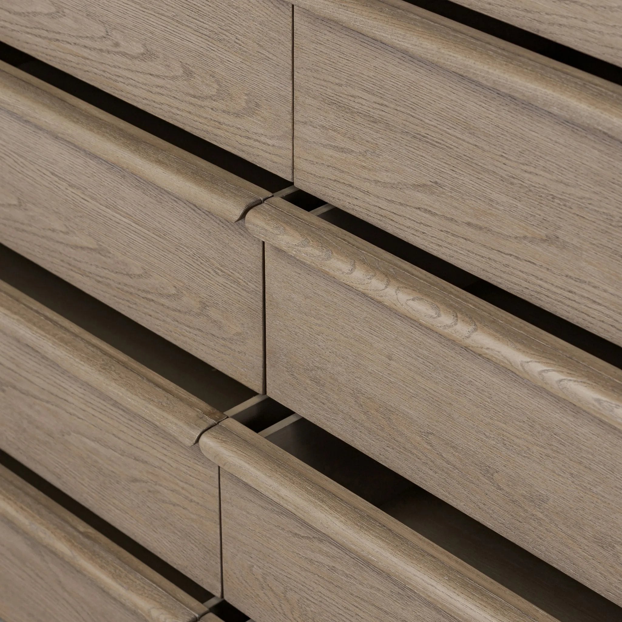 Rounded corners soften the straight-edged look of this 10-drawer dresser, crafted from natural oak in a warm grey finish. Wide smooth-gliding drawers are fully finished on the inside Amethyst Home provides interior design, new home construction design consulting, vintage area rugs, and lighting in the Seattle metro area.