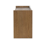 Resawn warm oak gives this sideboard's simple paneled design its standout striations. The paneled frame has a gallery top, and the bottom shelf provides open storage Amethyst Home provides interior design, new home construction design consulting, vintage area rugs, and lighting in the Austin metro area.