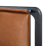 Ebony-finished oak frames a sling-style headboard made from top-grain leather, with subtly rounded edges and metal dowel detailing Amethyst Home provides interior design, new home construction design consulting, vintage area rugs, and lighting in the Monterey metro area.