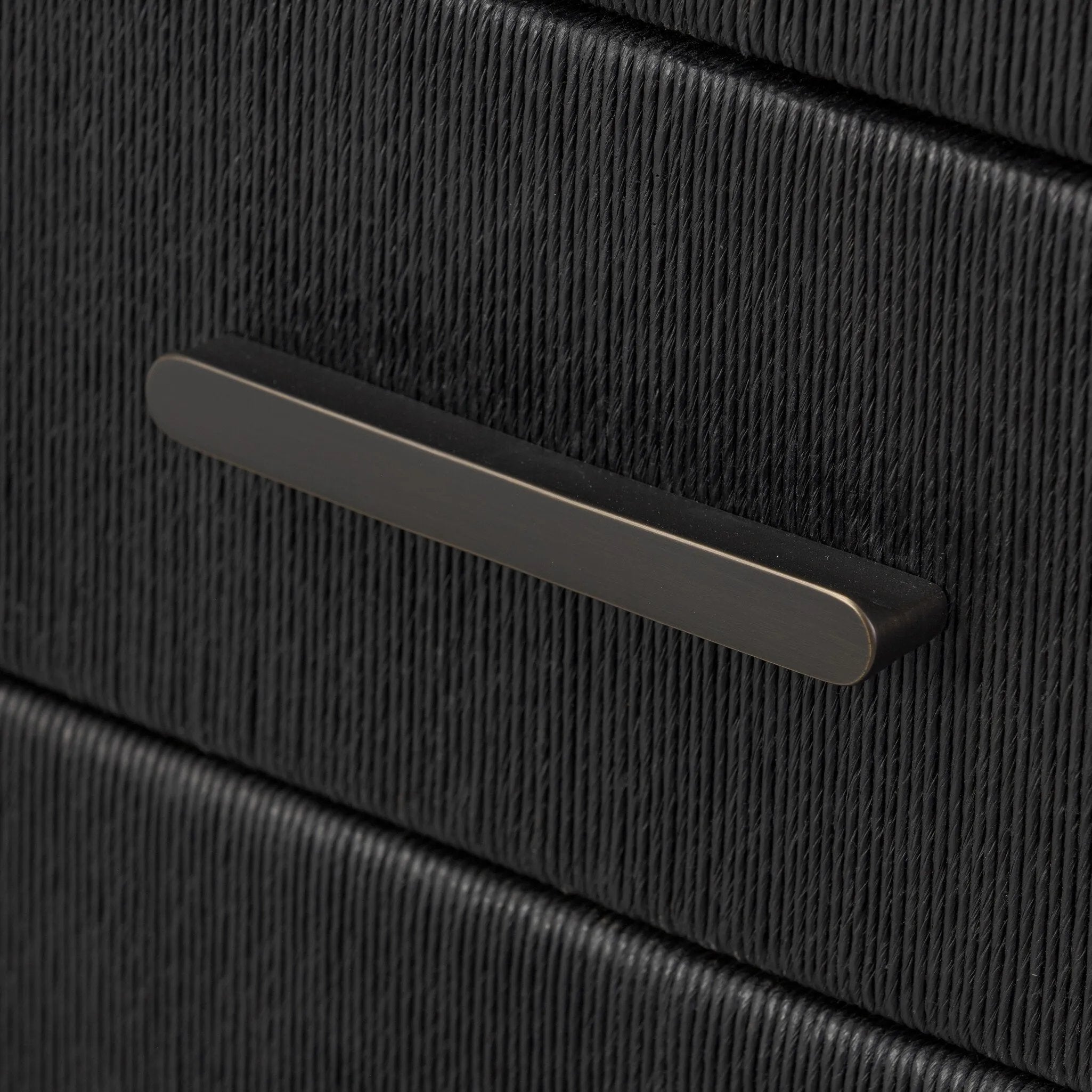 Elevate your bedroom styling with a storage-driven dresser of black-finished oak. A smooth top pairs with eight spacious drawers covered with woven paper cord. The result: a dark, Scandinavian-inspired look that will work into your collection beautifully Amethyst Home provides interior design, new home construction design consulting, vintage area rugs, and lighting in the Des Moines metro area.