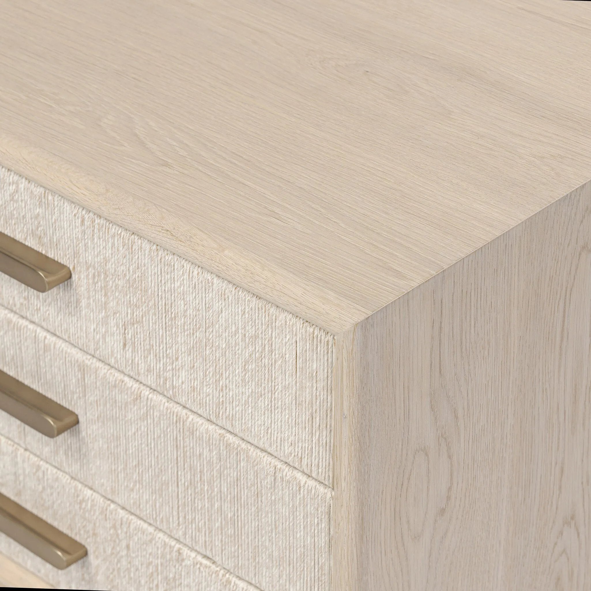 Elevate your bedside storage with a nightstand of light, natural oak. A smooth top pairs with three drawer fronts of woven paper cord for a clean, Scandinavian-inspired look that will work into your bedroom collection beautifully Amethyst Home provides interior design, new home construction design consulting, vintage area rugs, and lighting in the Park City metro area.