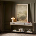 Featuring Rosenell Natural Oak Veneer Console Table 78" by Four Hands at Amethyst Home. Elevate your living space or media room with a slim-profile console of light, natural oak. A smooth top pairs with three drawers covered with woven paper cord, while lower open shelving creates bonus storage and display options. The result: a clean, Scandinavian-inspire. Amethyst Home provides interior design, new home construction design consulting, vintage area rugs, and lighting in the Des Moines metro area.