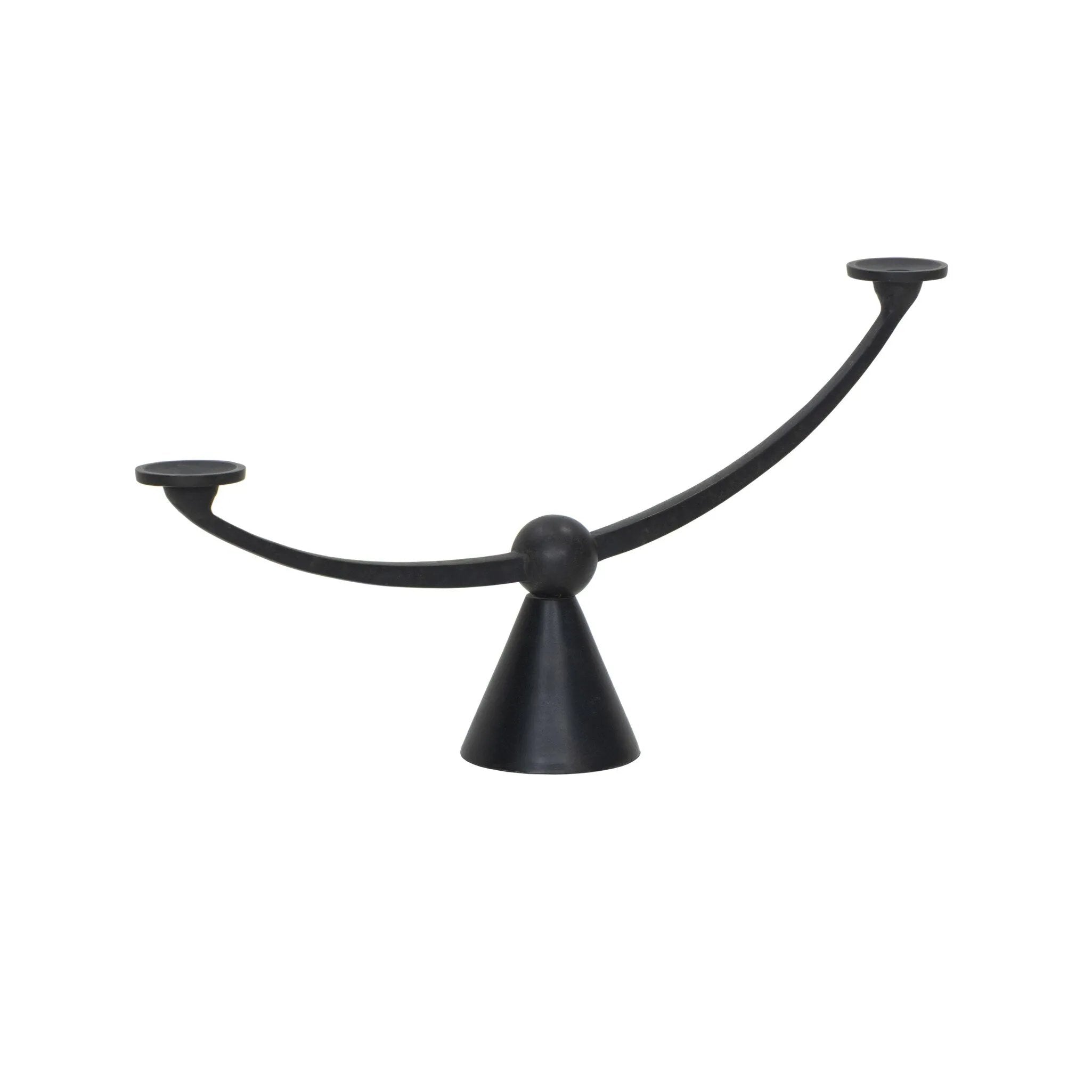 Cast aluminum shapes a statement-sized candle holder, with an asymmetrical format and swooping arms across a ball finial detail in the center. The balance of molded, cast shapes meets the refined geometric look of the tapered base. Use with tapered candles only Amethyst Home provides interior design, new home construction design consulting, vintage area rugs, and lighting in the Houston metro area.