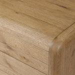 Blending modern design with classic features, this dresser is at once soft and bold. Set low to the ground on rounded feet, the dresser has prominent rounded corners that emphasize its smooth finish. Crafted from solid warm oak and veneers with push-latch hardware for a clean front Amethyst Home provides interior design, new home construction design consulting, vintage area rugs, and lighting in the Kansas City metro area.