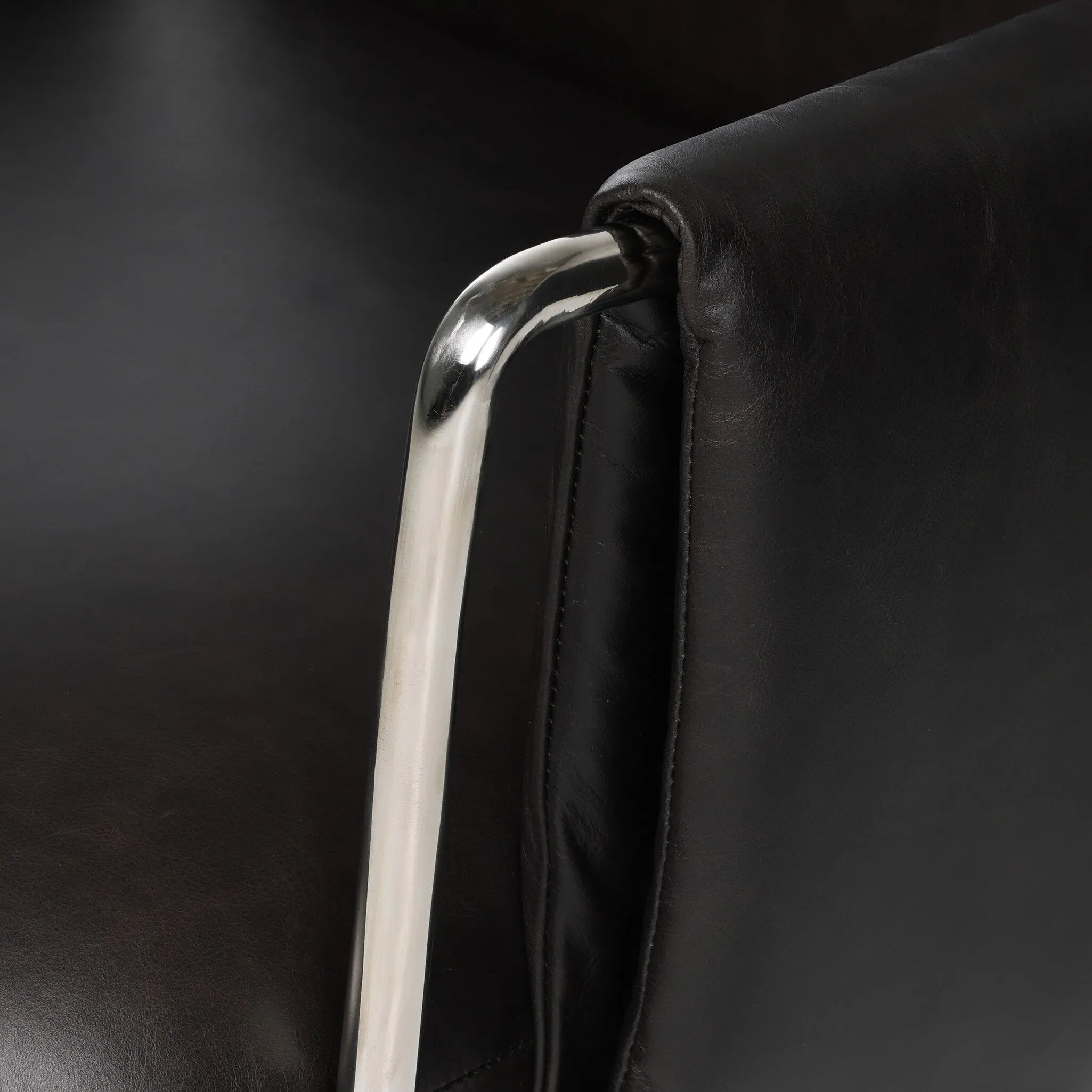 Shiny stainless steel frames Four Hands-exclusive top-leather cushioning for a balance of comfort and edge. Overfilled for a relaxed sit, a cushioned seat and back keep things supportive. Adjustable height and smooth 360-swivel bring ease to your workspace Amethyst Home provides interior design, new home construction design consulting, vintage area rugs, and lighting in the Dallas metro area.