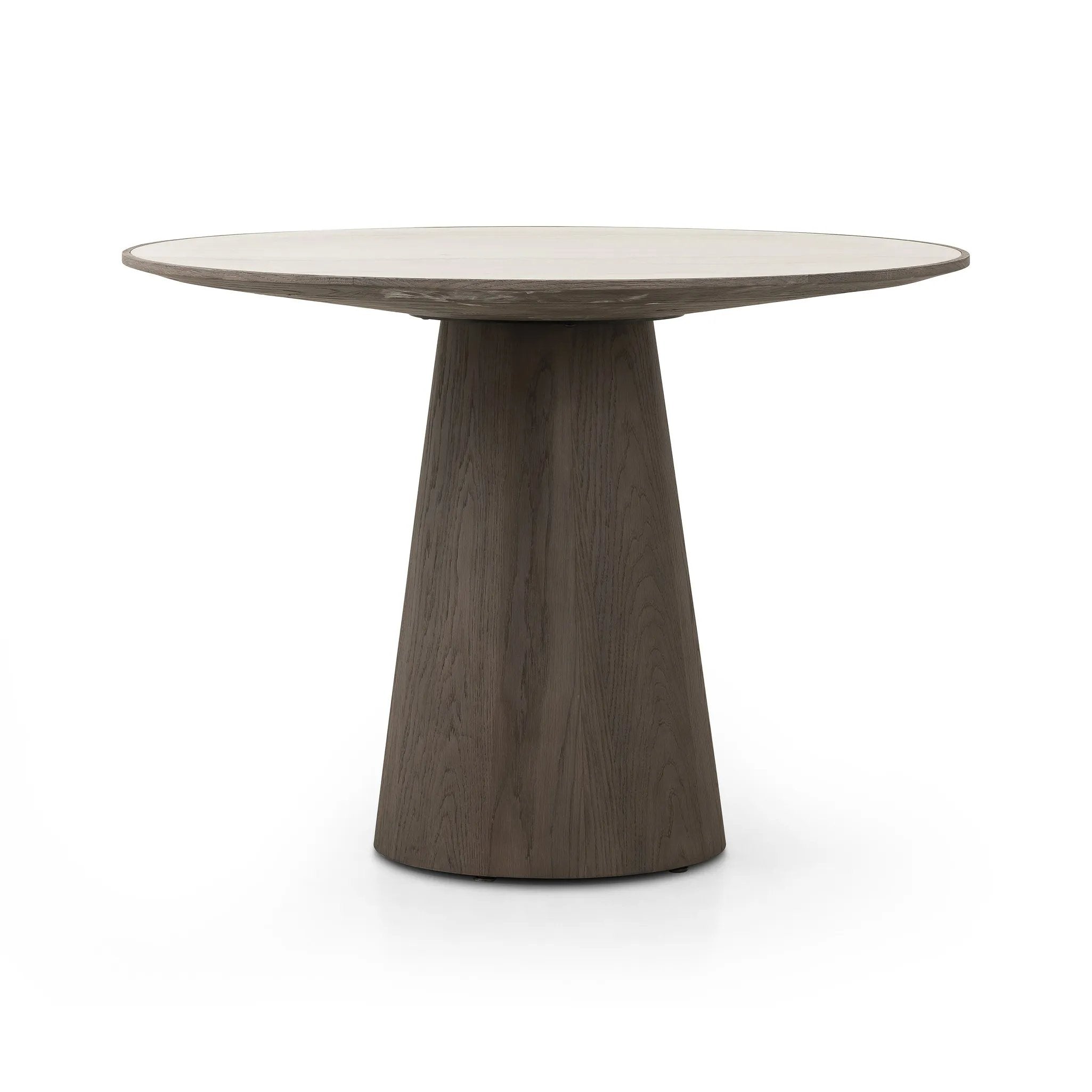Featuring Skye White Marble Round Dining Table by Four Hands at Amethyst Home. Mixed materials make for great drama. A cone-tapered base of dark, weathered oak supports a rounded tabletop of white-finished solid marble, with oak banding on the edges for thoughtful contrast.Overall Dimensions: 42.00"w x 42.00"d x 30.00"hWeight : 158.73 lbsMaterials : Solid Marb. Amethyst Home provides interior design, new home construction design consulting, vintage area rugs, and lighting in the Austin metro area.