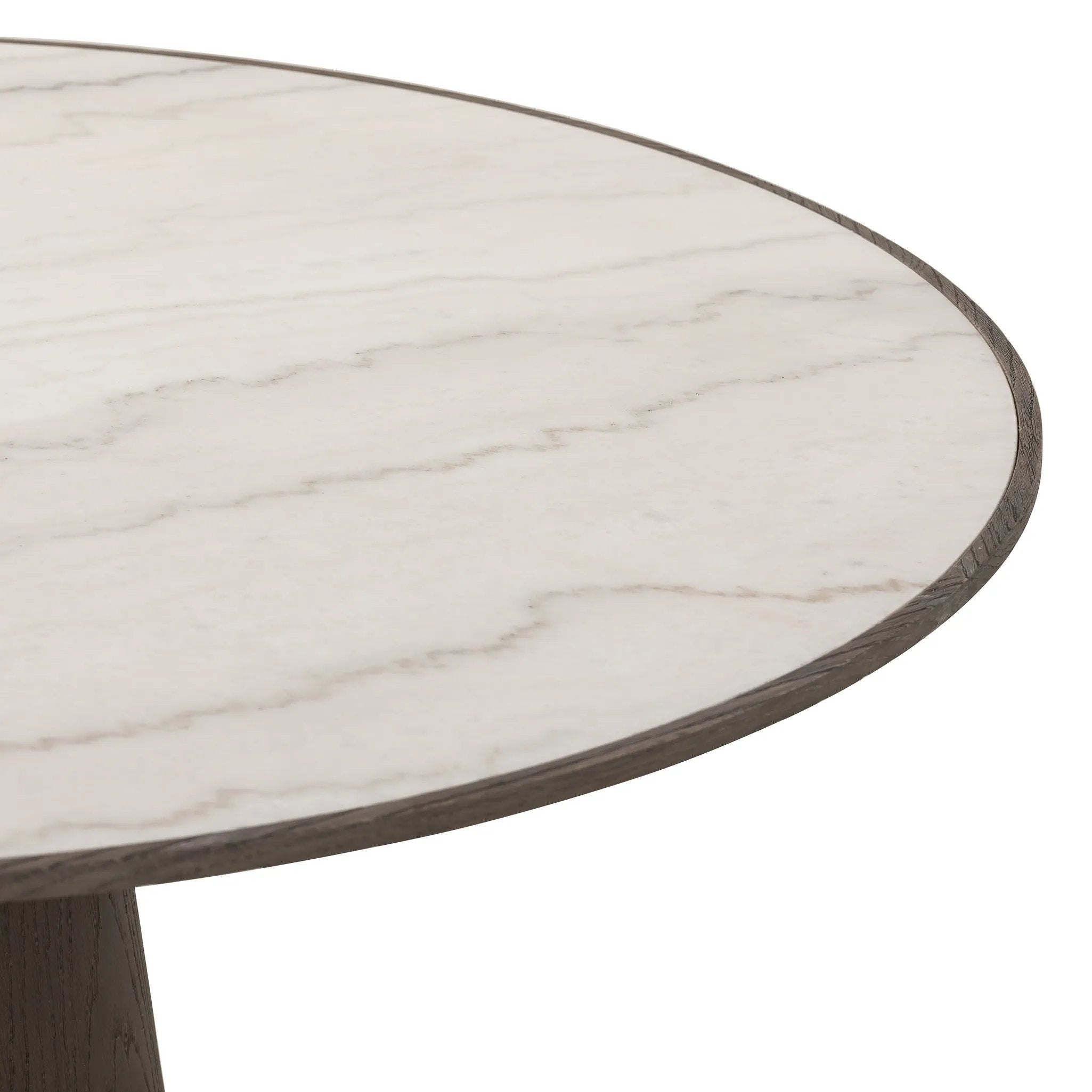 Featuring Skye White Marble Round Dining Table by Four Hands at Amethyst Home. Mixed materials make for great drama. A cone-tapered base of dark, weathered oak supports a rounded tabletop of white-finished solid marble, with oak banding on the edges for thoughtful contrast.Overall Dimensions: 42.00"w x 42.00"d x 30.00"hWeight : 158.73 lbsMaterials : Solid . Amethyst Home provides interior design, new home construction design consulting, vintage area rugs, and lighting in the Des Moines metro area.