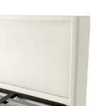 A shorter wingspan and geometric cutouts define this modern-day shelter wingback bed, designed for comfort from every angle. Upholstered in a cream fabric with subtle texture and a soft hand Amethyst Home provides interior design, new home construction design consulting, vintage area rugs, and lighting in the Austin metro area.