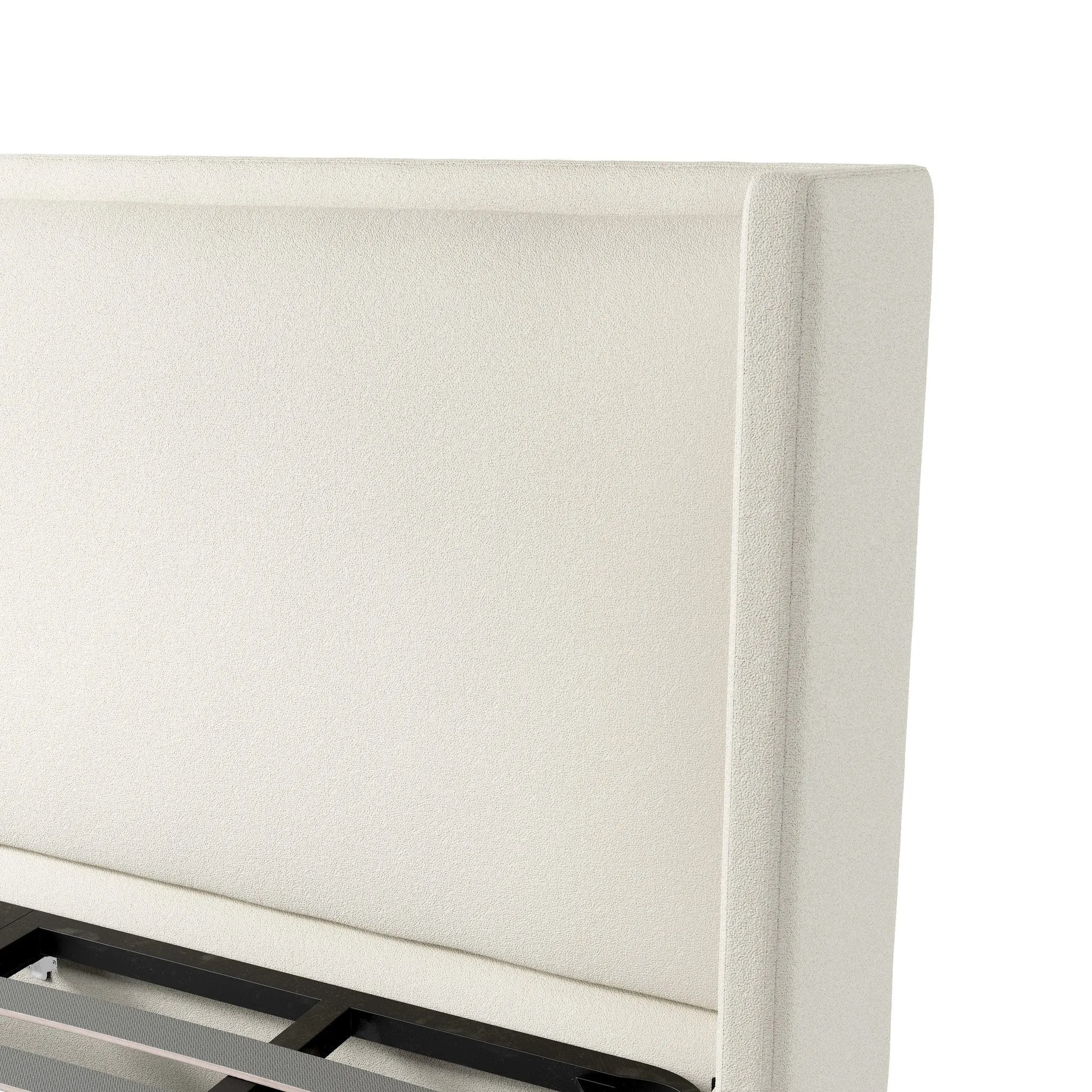 A shorter wingspan and geometric cutouts define this modern-day shelter wingback bed, designed for comfort from every angle. Upholstered in a cream fabric with subtle texture and a soft hand Amethyst Home provides interior design, new home construction design consulting, vintage area rugs, and lighting in the Scottsdale metro area.