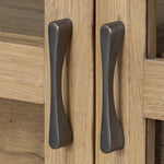 Display solo or create classic cabinetry with side-by-side multiples. This smoked oak cabinet has two drawers and multiple shelves, making a welcoming combination of open and closed storage Amethyst Home provides interior design, new home construction design consulting, vintage area rugs, and lighting in the Omaha metro area.