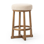 Featuring Staria Saxon Sand Swivel Stool by Four Hands at Amethyst Home. Perfectly sized for the counter, a 360-degree swivel stool pairs a warm oak frame with sand seating in a chunky basketweave. Tapered legs meet a crossed base ties it all together. Overall Dimensions: 18.25"w x 18.25"d x 27.50"h. Amethyst Home provides interior design, new home construction design consulting, vintage area rugs, and lighting in the Austin metro area.