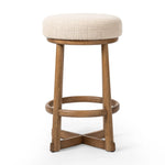 Featuring Staria Saxon Sand Swivel Stool by Four Hands at Amethyst Home. Perfectly sized for the counter, a 360-degree swivel stool pairs a warm oak frame with sand seating in a chunky basketweave. Tapered legs meet a crossed base ties it all together. Overall Dimensions: 18.25"w x 18.25"d x 27.50"h. Amethyst Home provides interior design, new home construction design consulting, vintage area rugs, and lighting in the Dallas metro area.