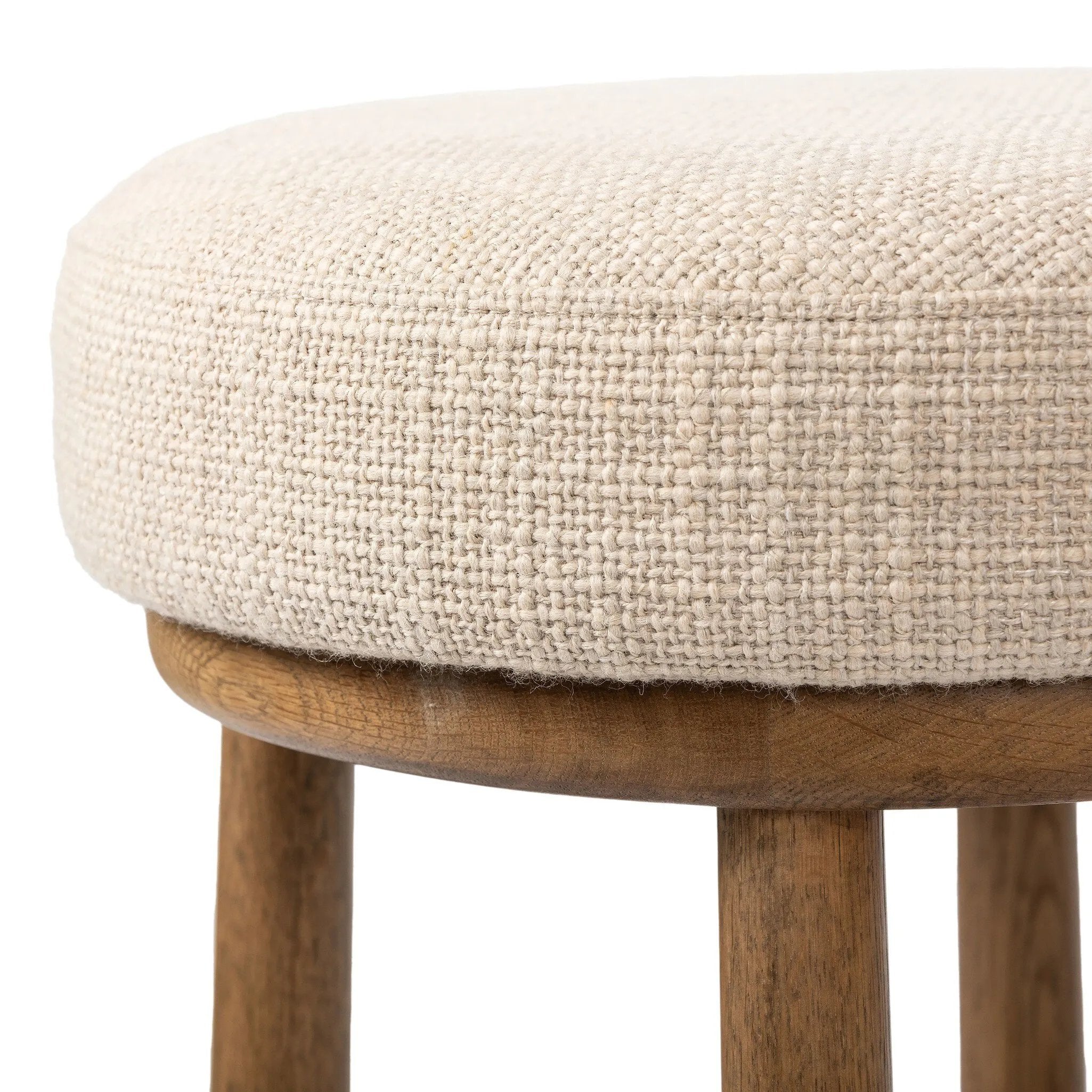 Featuring Staria Saxon Sand Swivel Stool by Four Hands at Amethyst Home. Perfectly sized for the counter, a 360-degree swivel stool pairs a warm oak frame with sand seating in a chunky basketweave. Tapered legs meet a crossed base ties it all together. Overall Dimensions: 18.25"w x 18.25"d x 27.50"h. Amethyst Home provides interior design, new home construction design consulting, vintage area rugs, and lighting in the Monterey metro area.