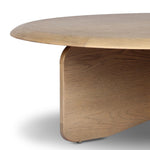 Featuring Surie Sandy Oak Resawn Coffee Table by Four Hands at Amethyst Home. A shape-driven piece inspired by clean Nordic design. Softened edges and a curved base craft a sense of flow, accentuated by cathedral grain oak with beautiful natural warmth. Overall Dimensions: 48.00"w x 48.00"d x 16.50"h. Amethyst Home provides interior design, new home construction design consulting, vintage area rugs, and lighting in the Seattle metro area.